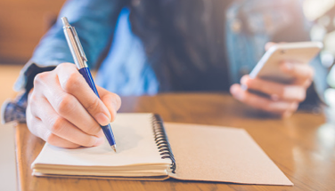 Writing in a note book